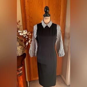 Gently used, black/white, Size medium.